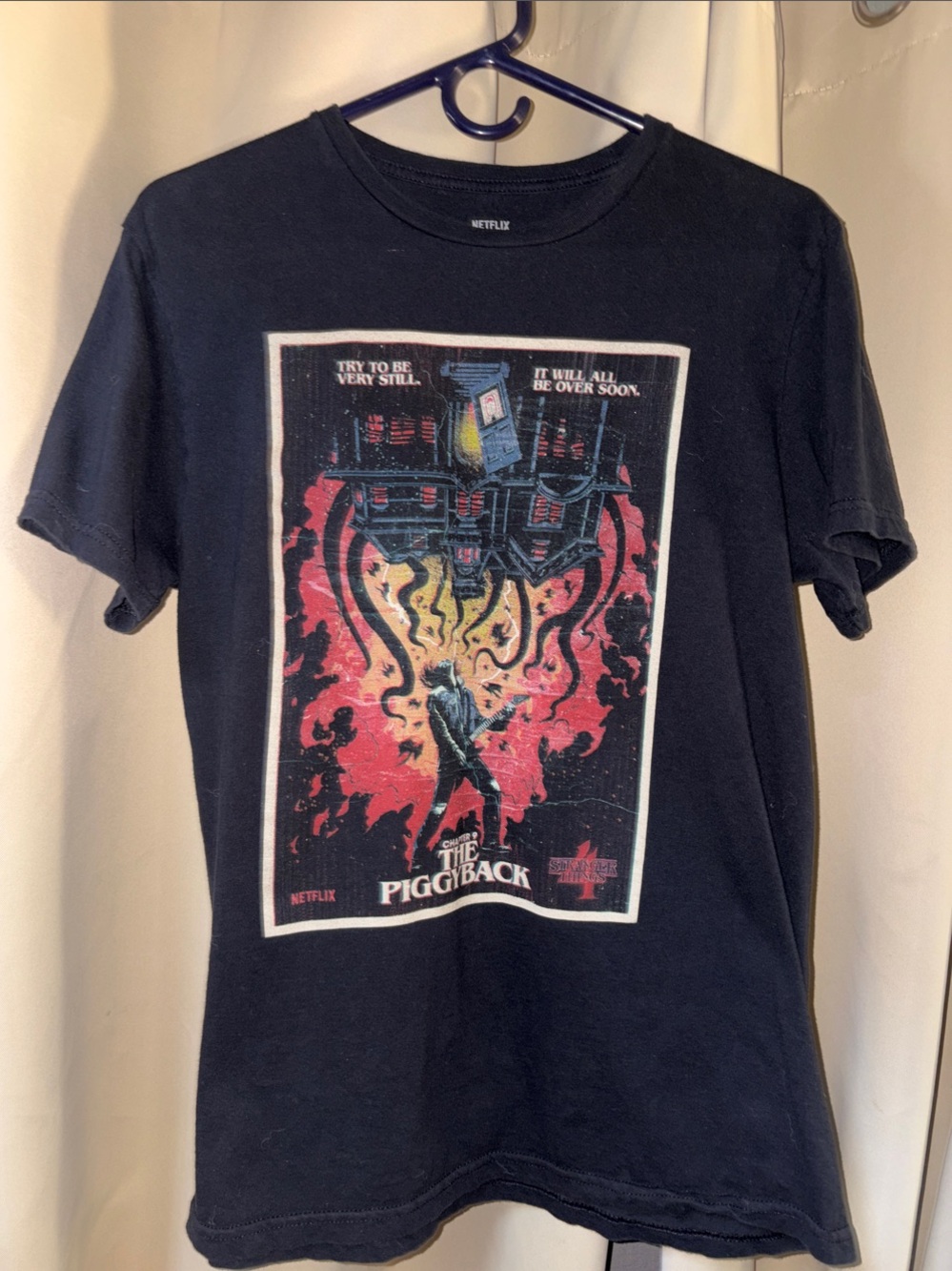 Netflix Black The Piggyback Graphic Tee with Red and Cream Print